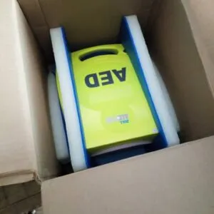 Defibrillator with external paddles